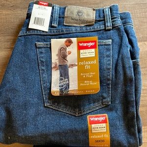 New Wrangler relaxed fit jeans. 38x30 dark blue